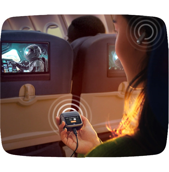 Plane passenger enjoying JBL Spatial 360 with head tracking
