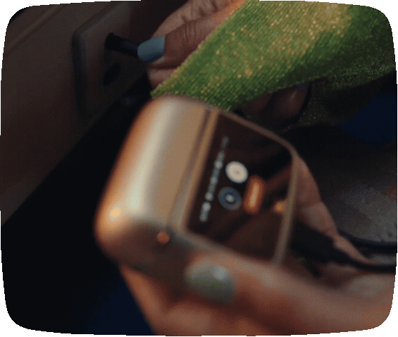 JBL Tour Pro 3 Smart Charging Case plugged into an audio source